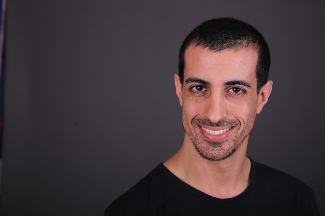 man in white v neck t-shirt